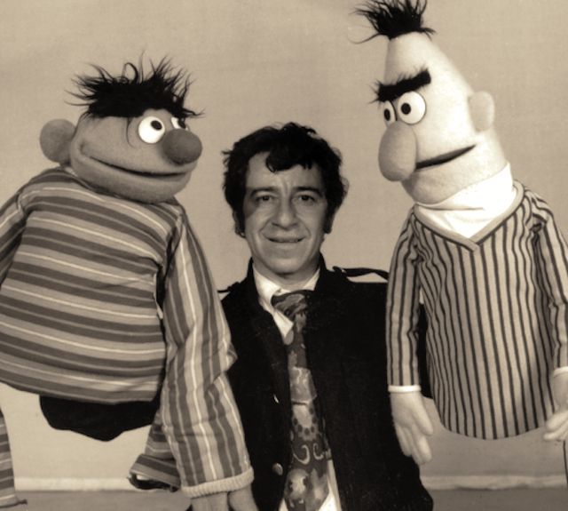 David Attie holding Bert and Ernie